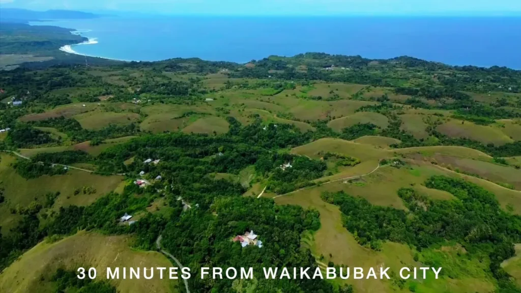 Green hills overlooking the coast and ocean at Lahikaraja, Parirara, Rua, West Sumba