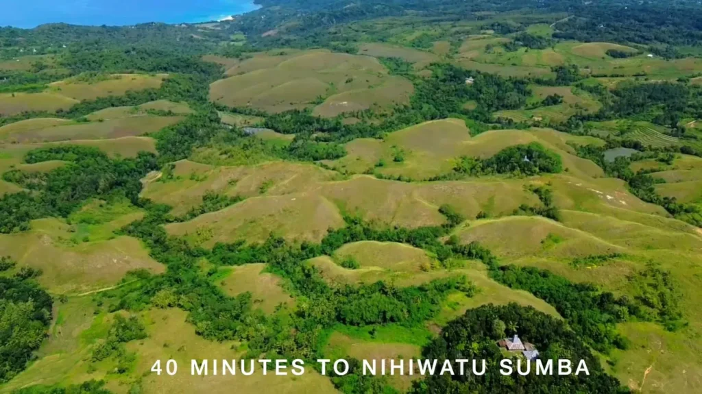 Panorama of rural fields and wooded valleys at Lahikaraja, Parirara, Rua, West Sumba