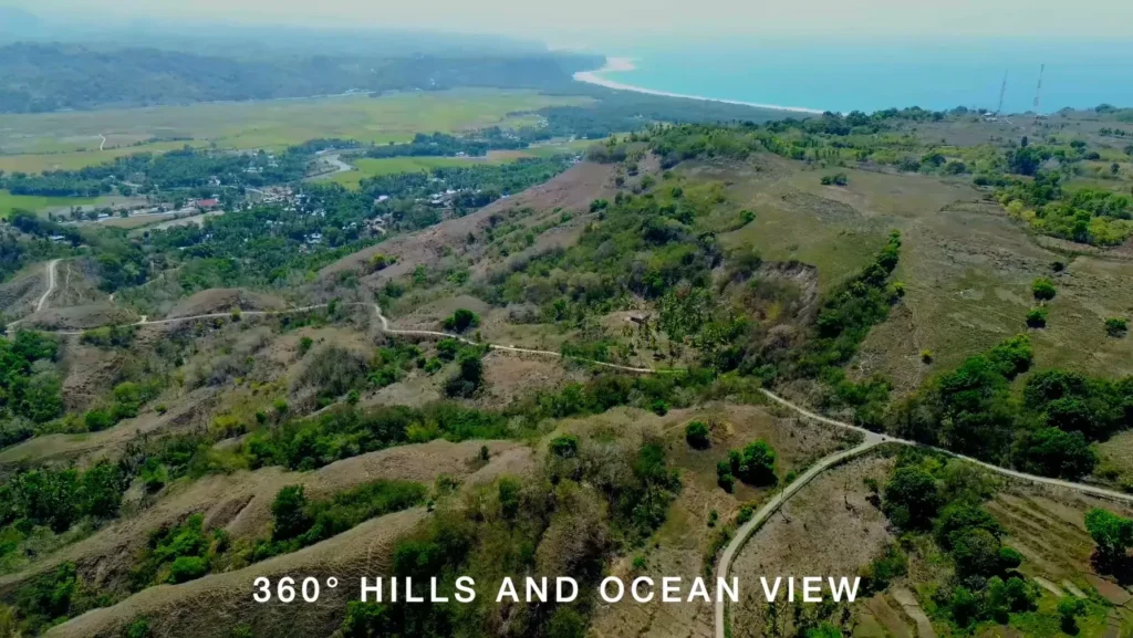 Green hills with the ocean visible in the distance at Parirara, Wanokaka, West Sumba