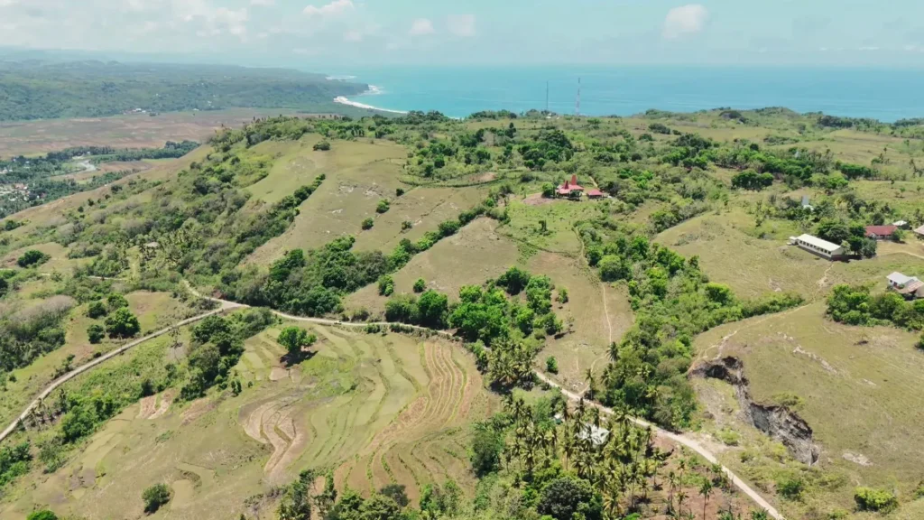 Aerial panorama of rural hills and fields at Wanokaka, Wanokaka, West Sumba